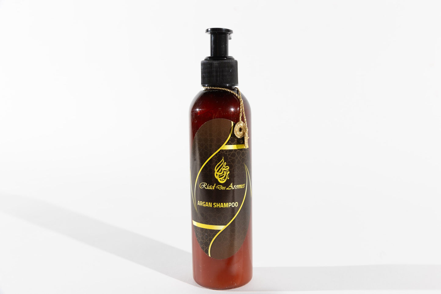 Hydrating Argan Shampoo in a sleek bottle, perfect for cleansing and nourishing hair, leaving it soft, shiny, and healthy.