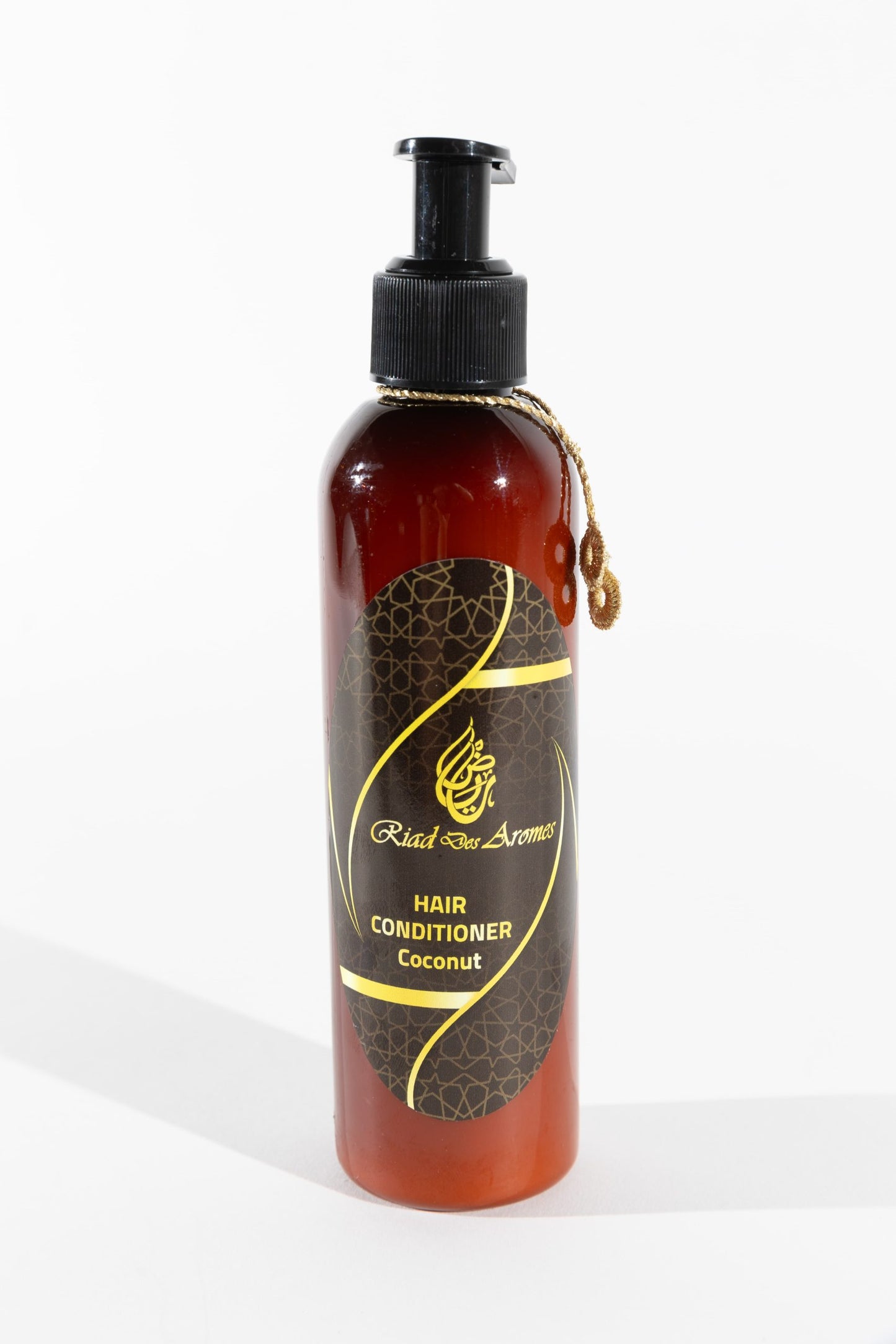 Nourishing Argan Conditioner with a tropical Coconut scent, perfect for hydrating and softening hair, leaving it silky smooth and beautifully fragrant.