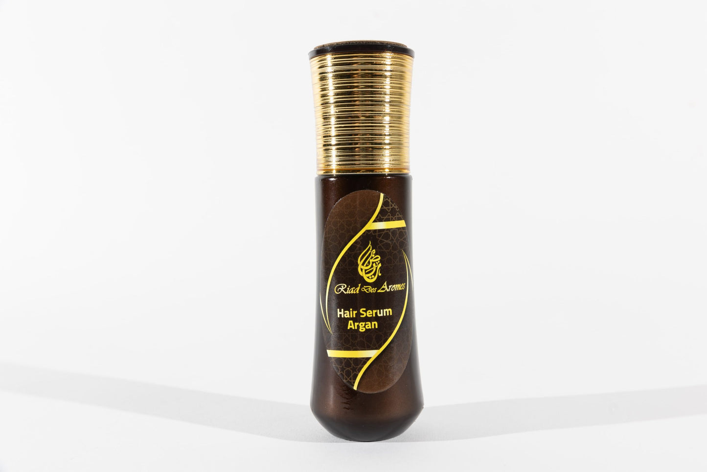 Argan Oil Hair Serum in a sleek bottle, ideal for nourishing and hydrating hair for a shiny, healthy look.