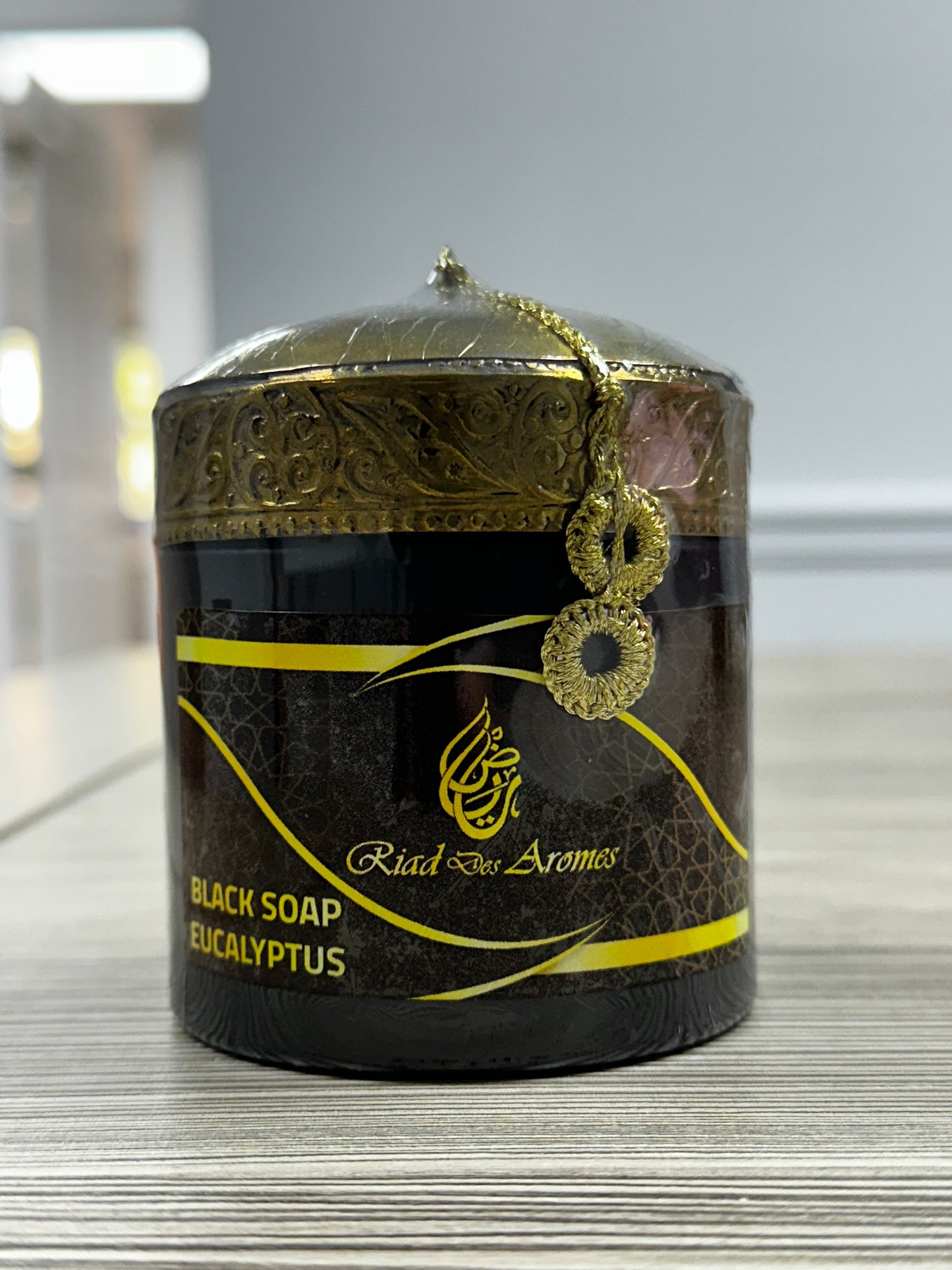 Black Soap with Eucalyptus in a traditional jar, ideal for deep cleansing and detoxifying the skin, leaving it refreshed and invigorated.